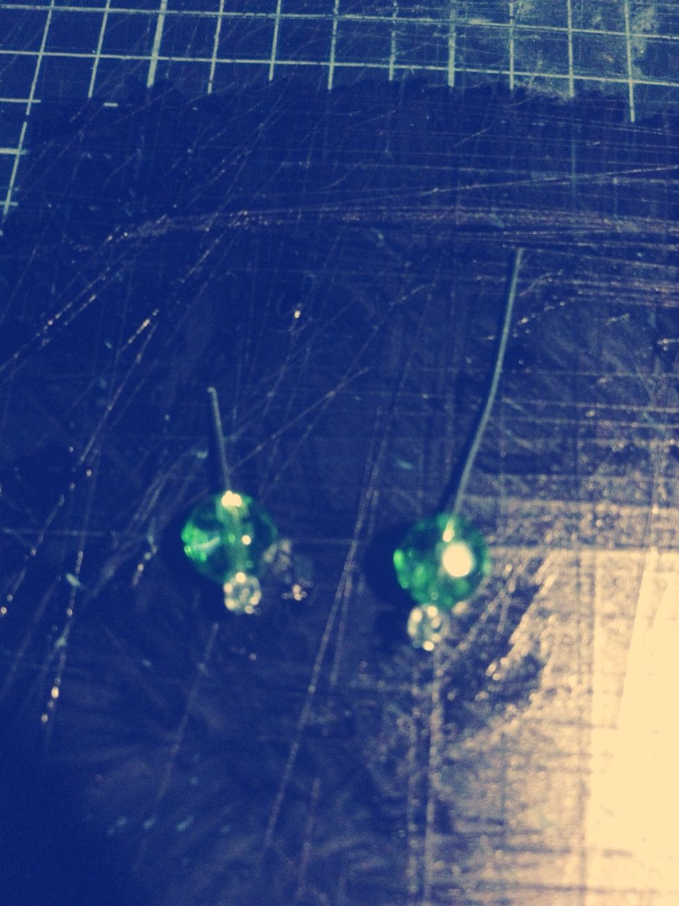 Having about this much left of the pin in proportion to the beads make a good loop.