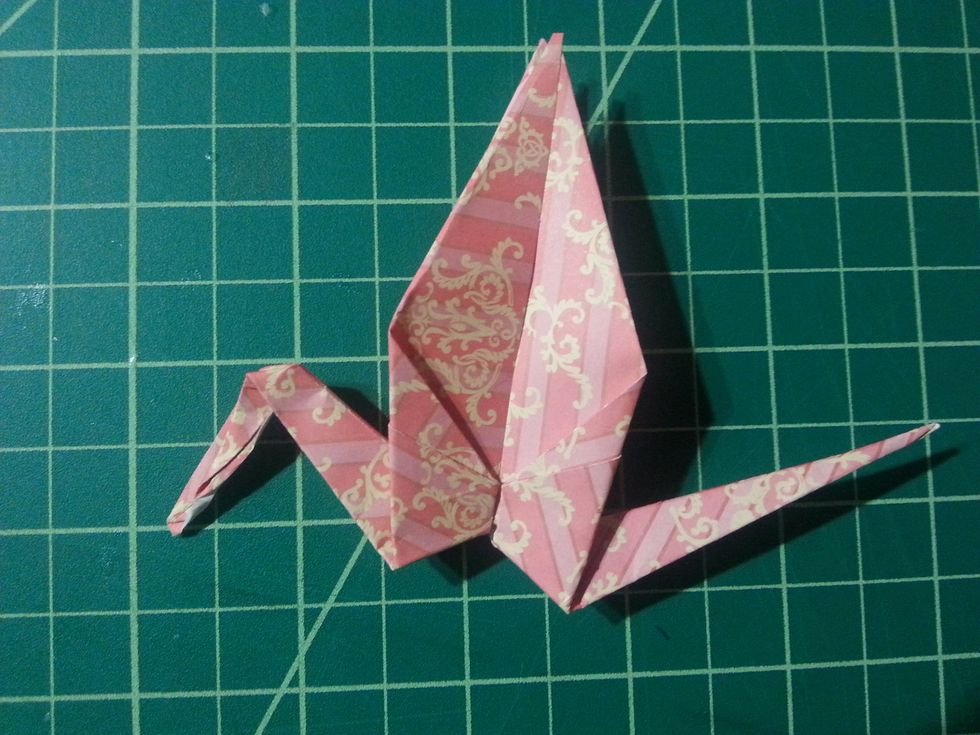 He we will do the Inside Reverse Fold. The shape should look like this when you're done. Refer to step #21 if you need a reference, the steps are similar.
