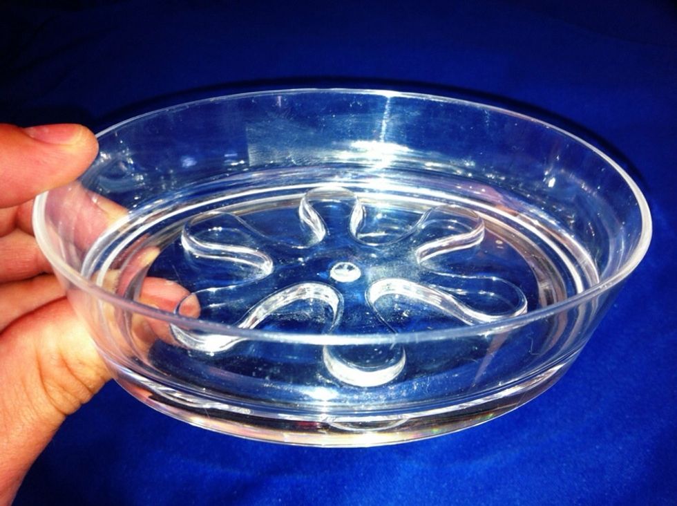 Head to the fashion bath department at your local Lowe\u2019s store and grab a clear plastic soap dish like this one. Peal off the interDesign sticker and clean the dish.