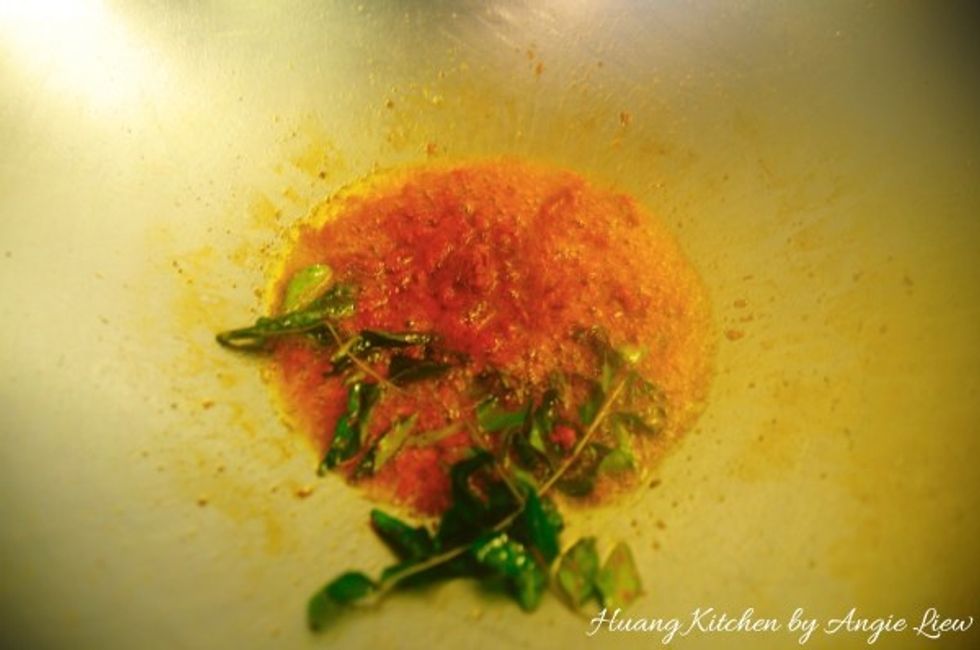 Heat 1/2 cup oil in a wok. Add chilli paste, chilli boh and curry leaves. Stir fry until fragrant and oil floats to the surface.