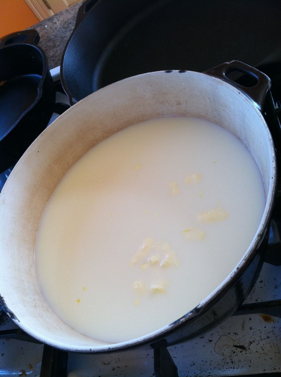 Heat 1/2 gallon of whole milk on high heat.