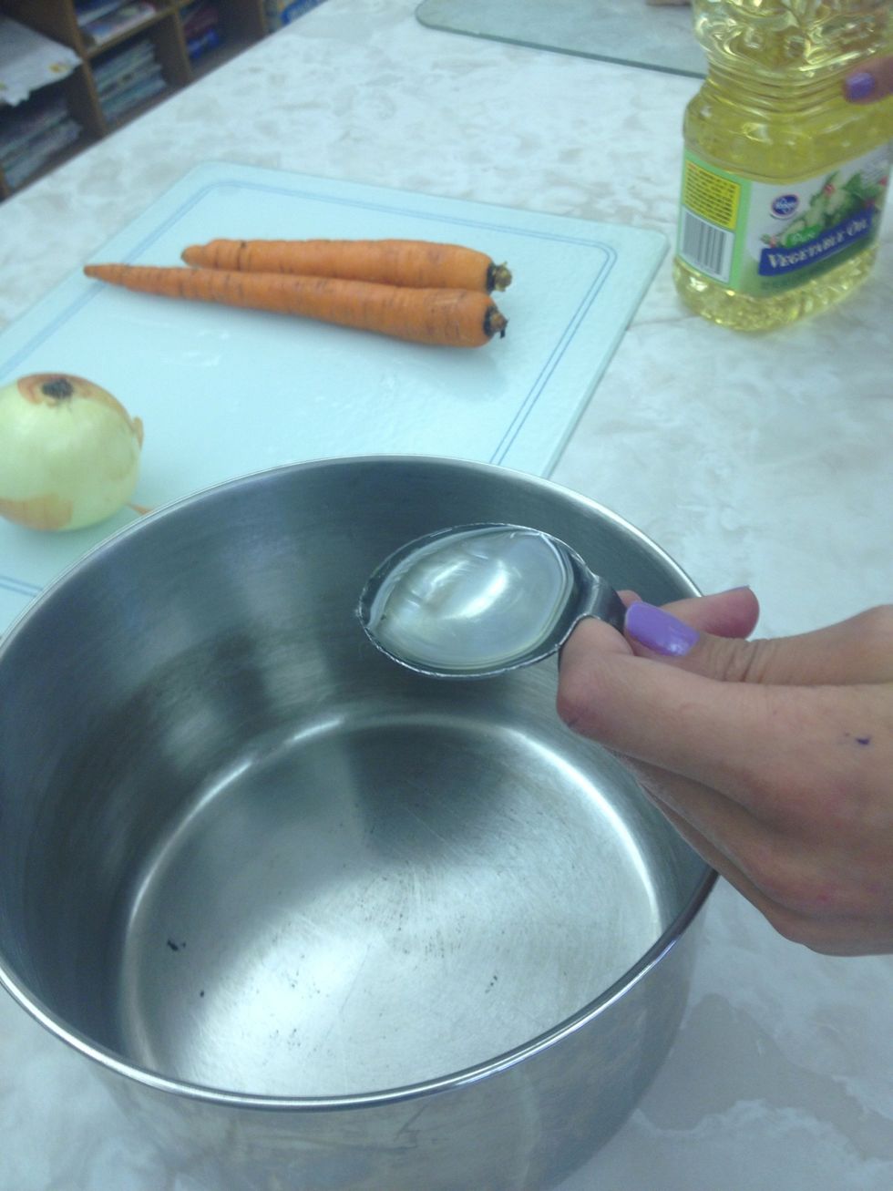 Heat 1 Tablespoon of oil in a pan on medium heat