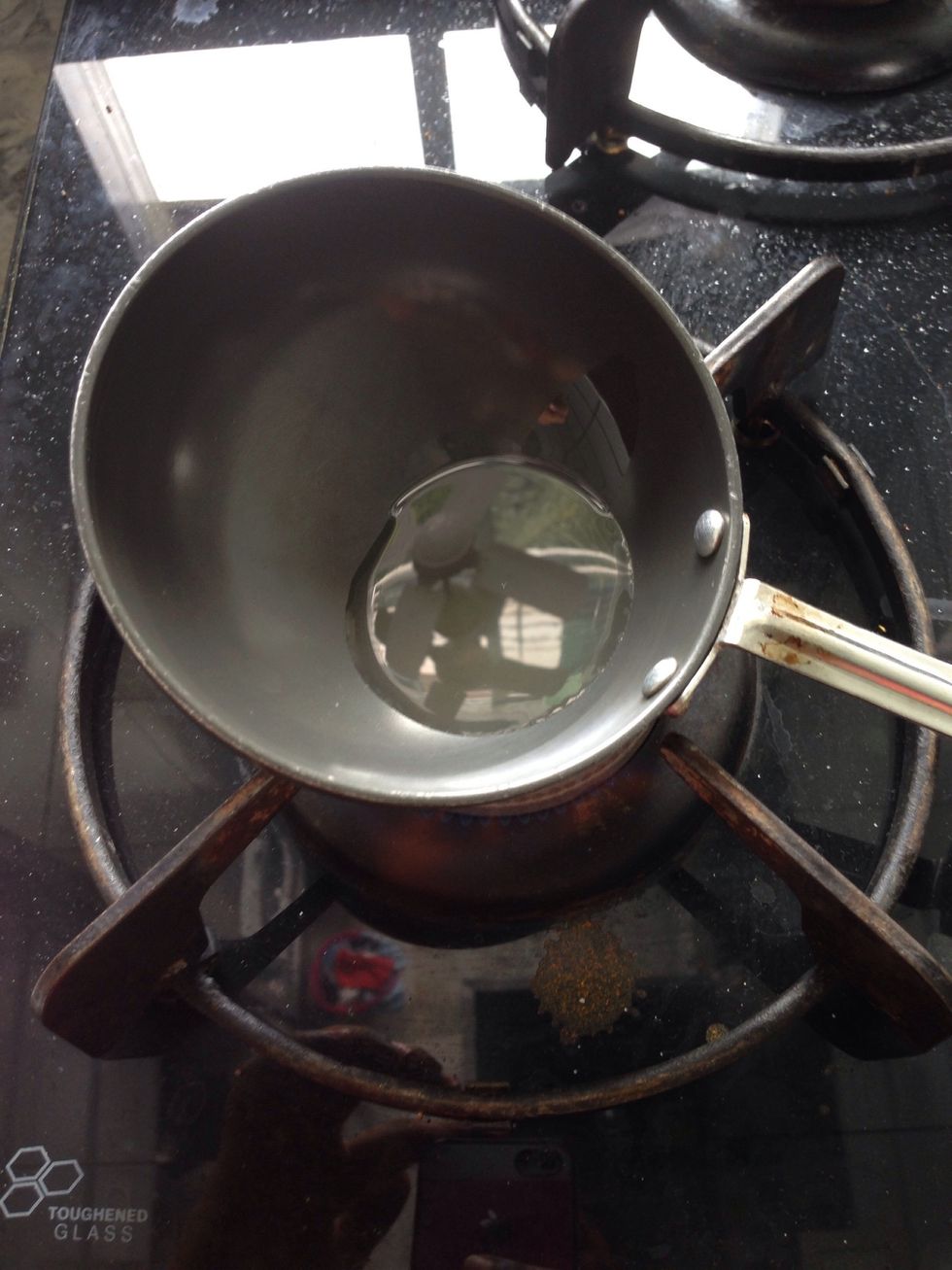 Heat 1 tablespoon oil (can take any)..