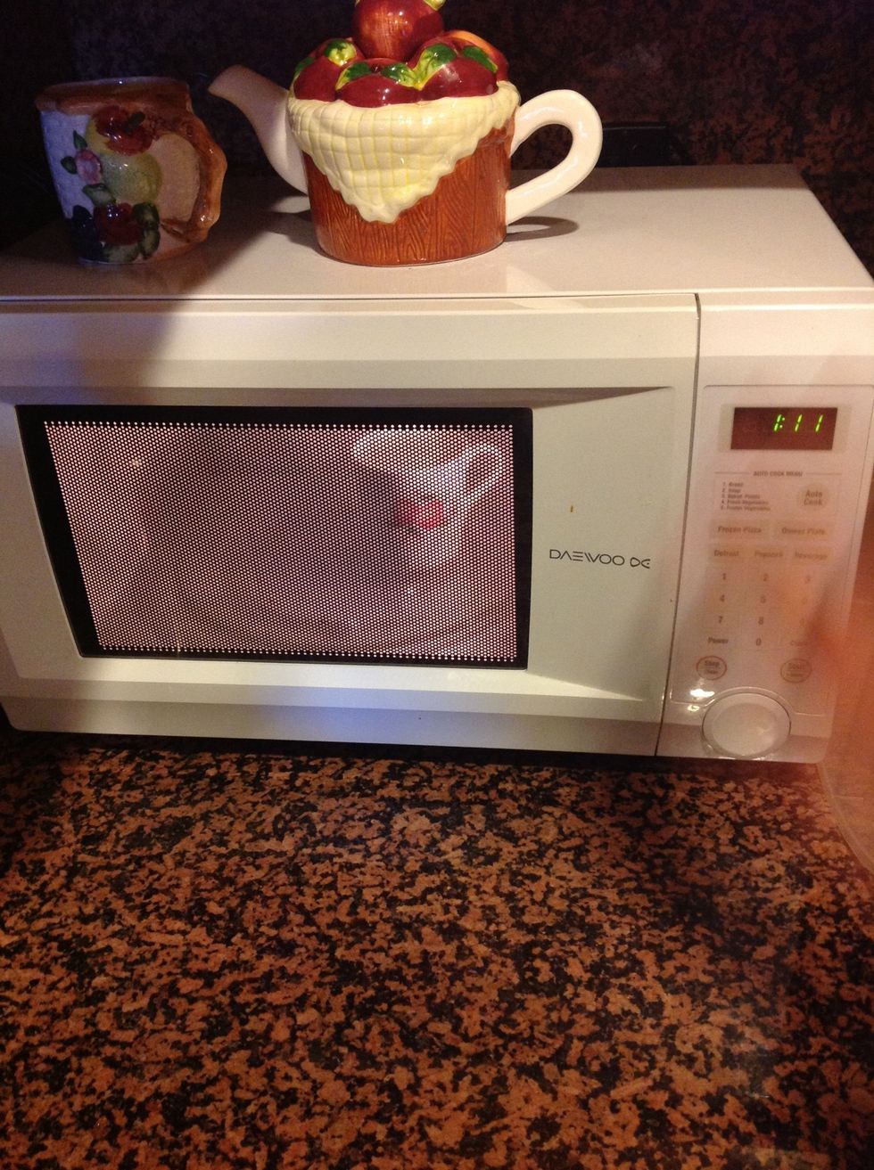 Heat 2 cups of milk in microwave for apx 1 min 15 secs