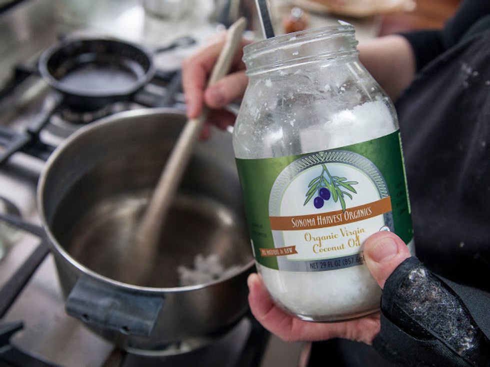 Heat 2 Tbs of coconut or other vegetable oil in a pot.