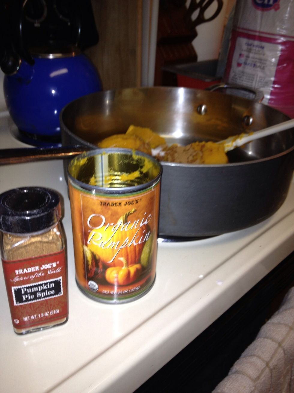 Heat a can of pumpkin pur\u00e9e in a pan, add 2 tsp pumpkin pie spice
