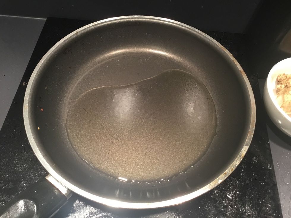 heat a frying pan with enough oil to cover base.