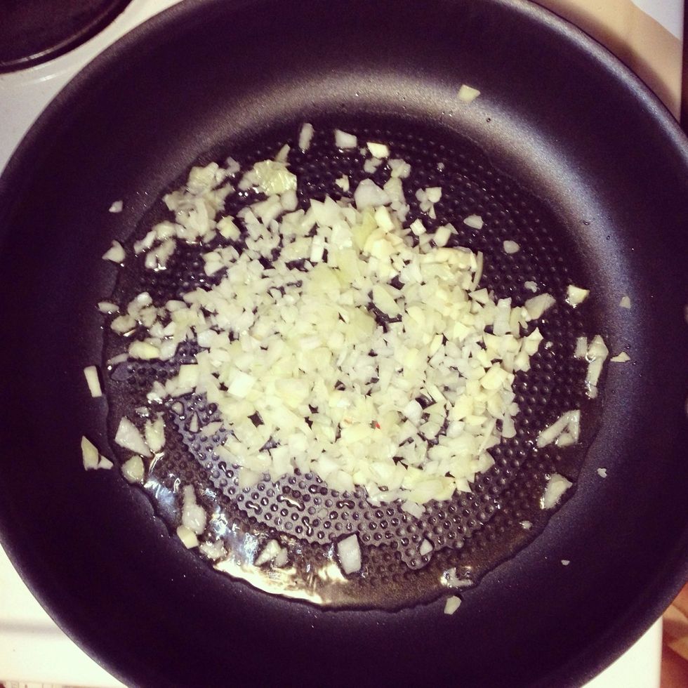 Heat a frying pan you can use in a griller. Add oil, onion & garlic over medium heat & saut\u00e9