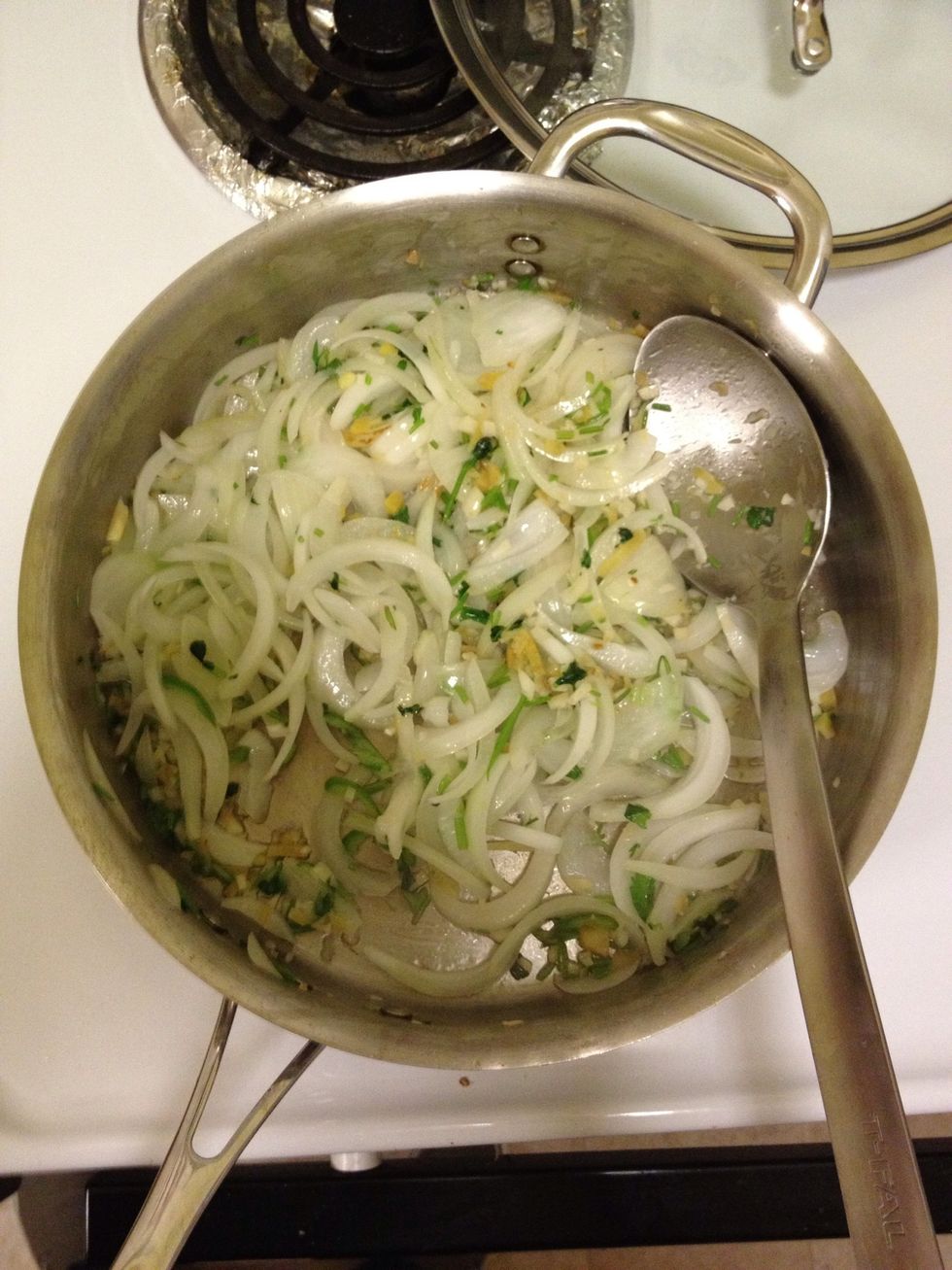 Heat a large saut\u00e9 pan over medium high heat. Add a pat of butter and/or couple TBSP of peanut oil. Add onion, garlic, ginger and chili and stir. You can smell this a few blocks away.