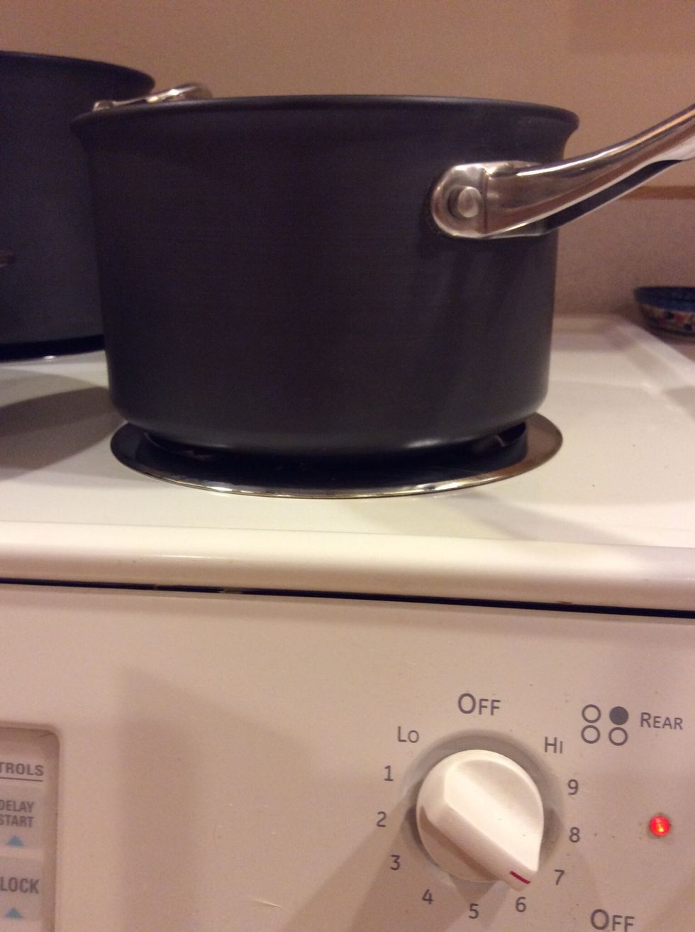 Heat a medium sauce pot over medium high heat. Make sure this is not a small pot, you will be making the risotto in this pan. Add in the last TBS of oil to the pan, once it is warm saut\u00e9 the onions.