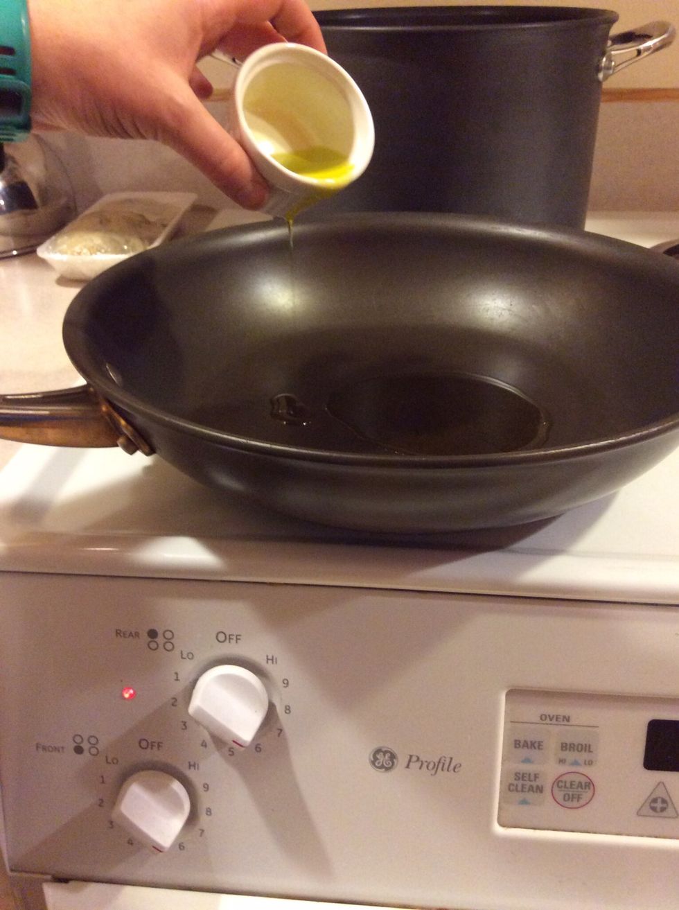 Heat a medium saut\u00e9 pan up over medium heat. Add in only 2 TBS of the olive oil.