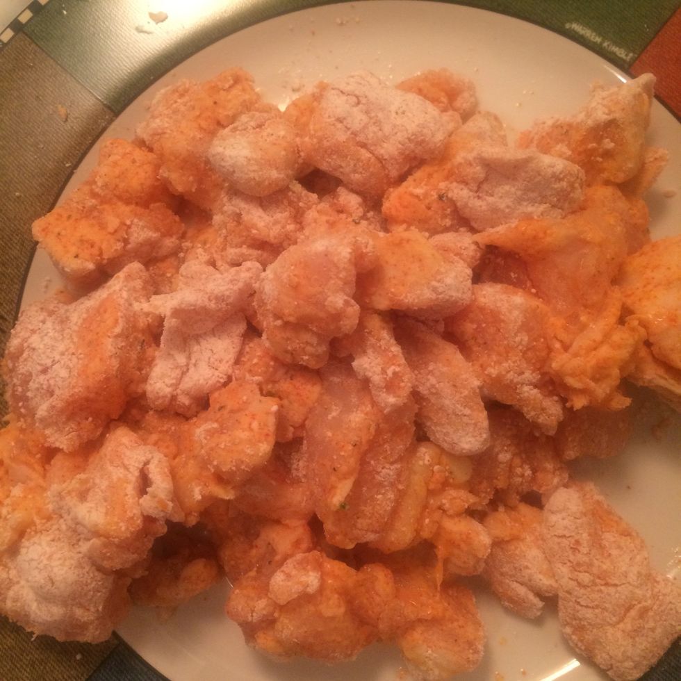 Heat a PAN with tbsp oil and add mixture chicken in the PAN. Fry until brown on each side 5mins. Place fried chicken a side in a plate.