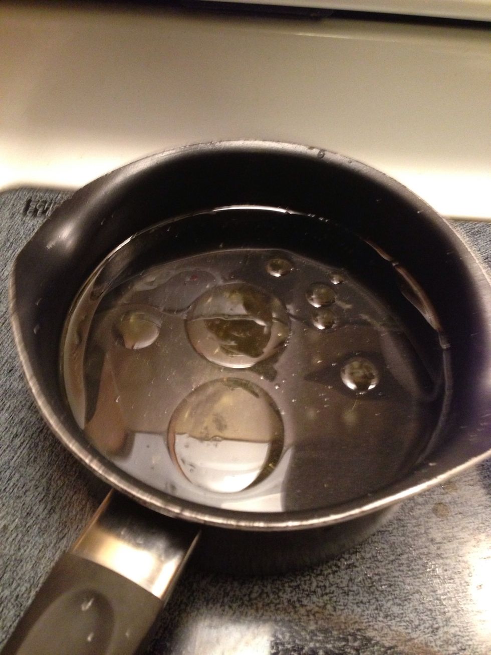 Heat a pot of water I add a little oil so It does t bubble over