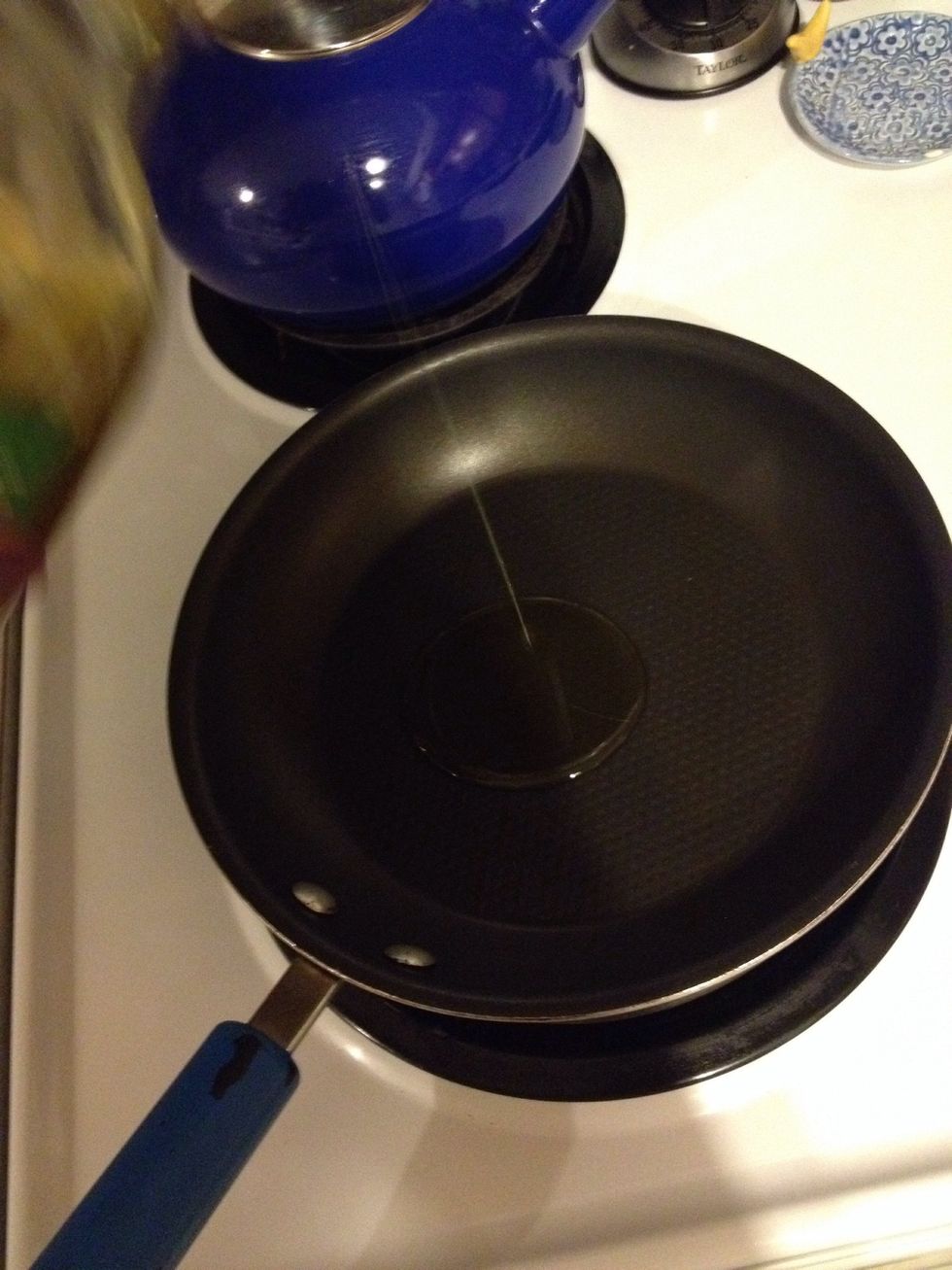 Heat a small-medium frying pan. I like to use olive oil, but whatever non-stick agent you like will do the trick.