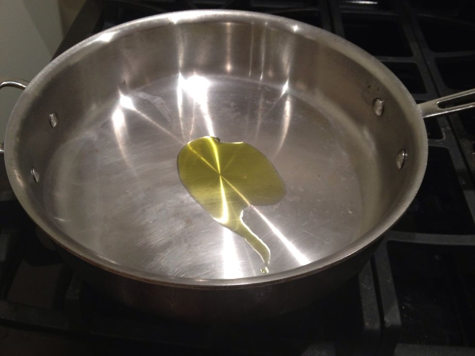 Heat a tablespoon if olive oil in a large skillet.