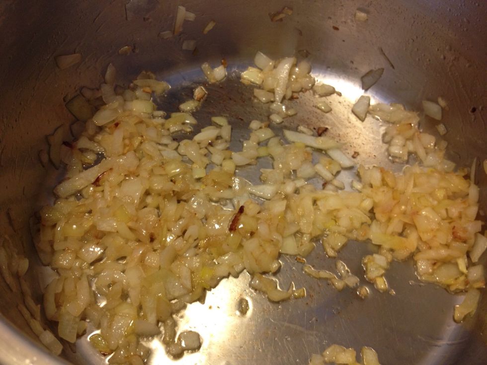 Heat about 2 Tbsp oil in a pot, and add the onions. Cook until lightly browned.