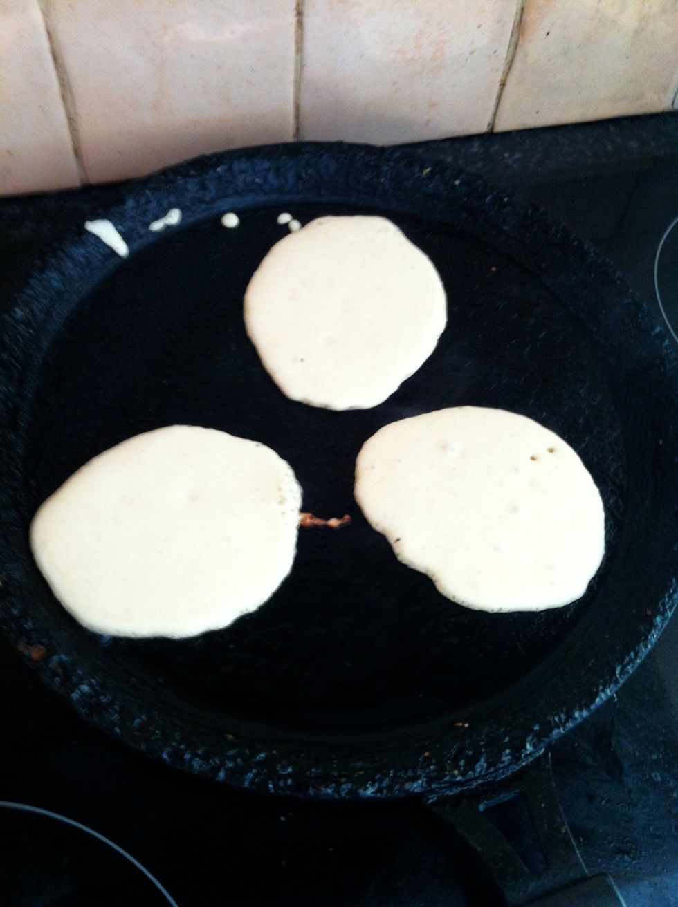 Heat and oil the frying pan. Drop table spoon sized amounts of the mixture onto the pan (I tend to get three per pan)