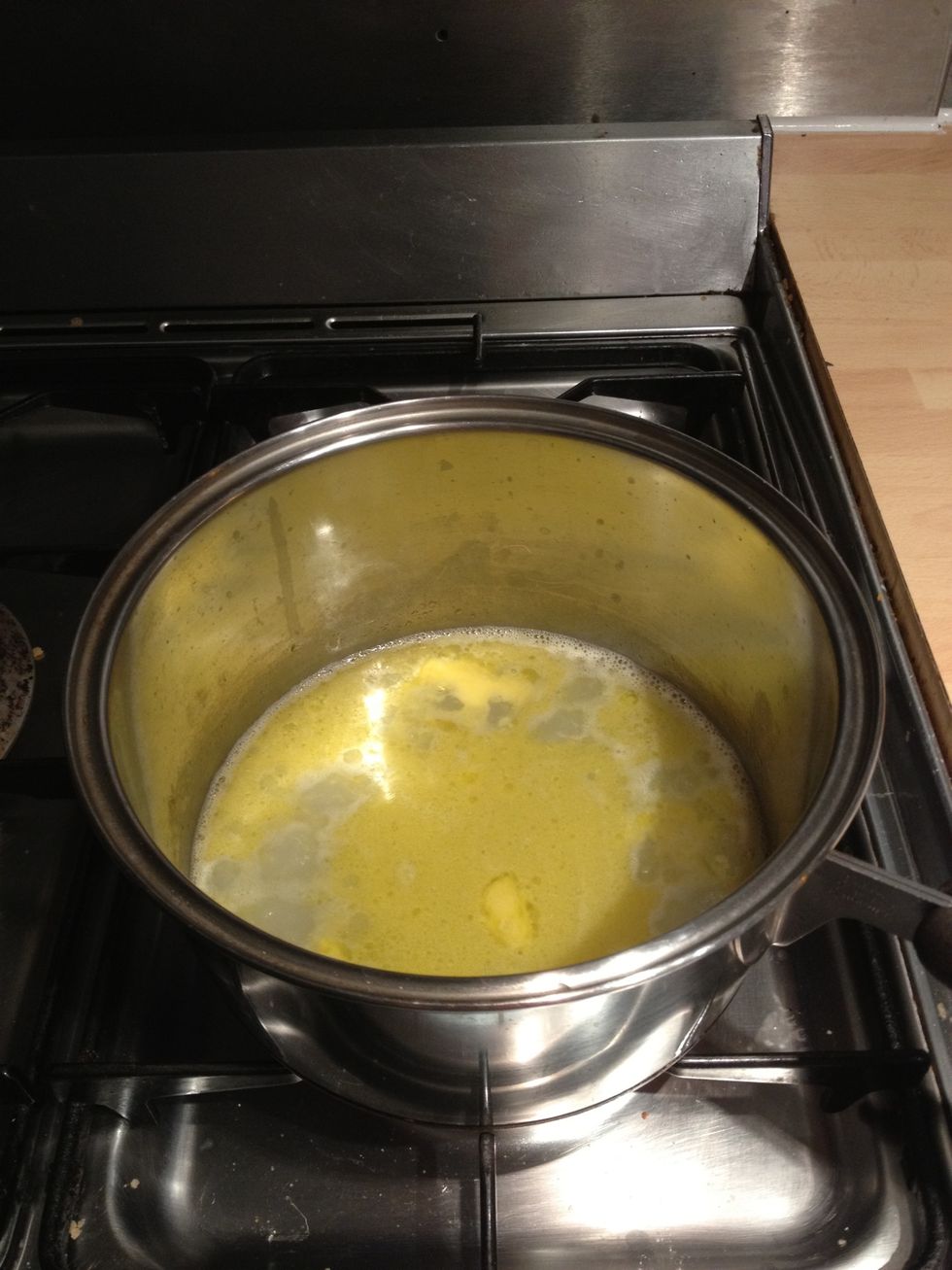 Heat and stir the water and butter mixture until combined.
