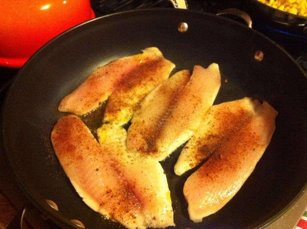 Heat another pan over medium high heat, add olive oil and tilapia. Sprinkle with tequila lime seasoning. Cook 5 minutes on each side.