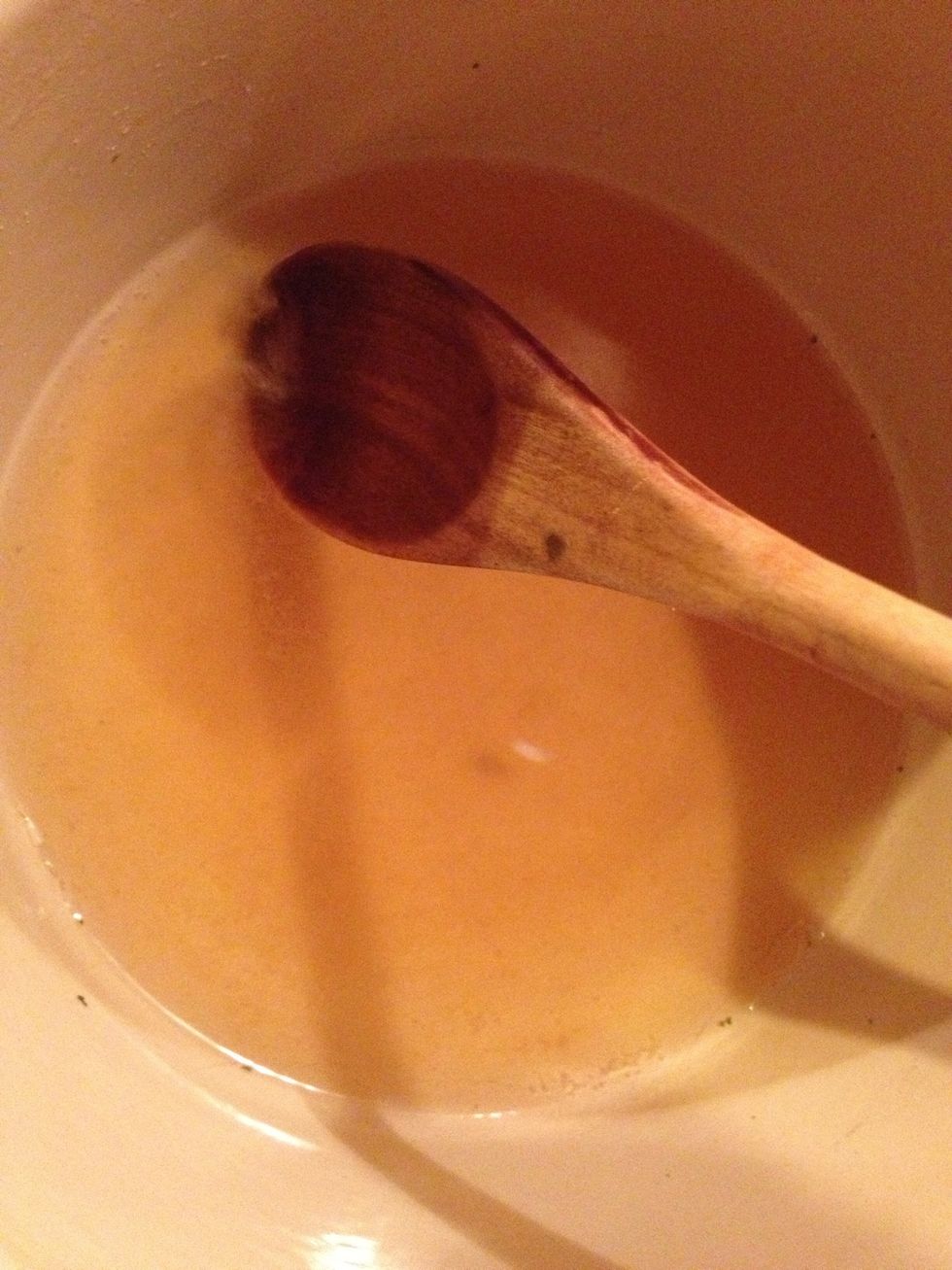 Heat beer over medium heat with the bouillon cube, until boiling.