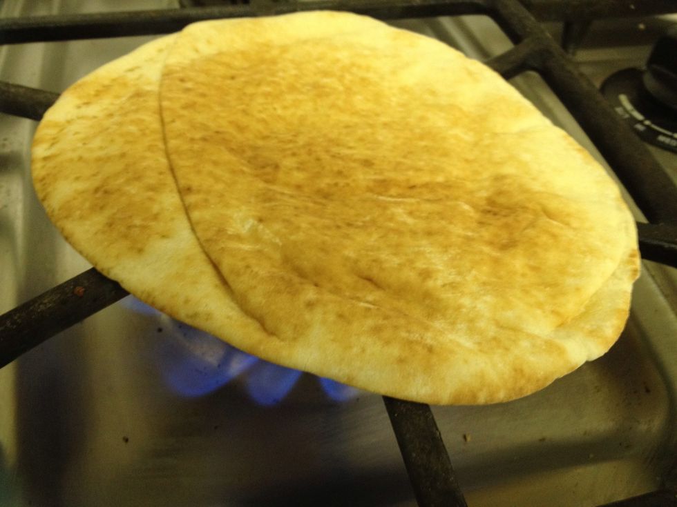 Heat bread over stove five seconds on each side.