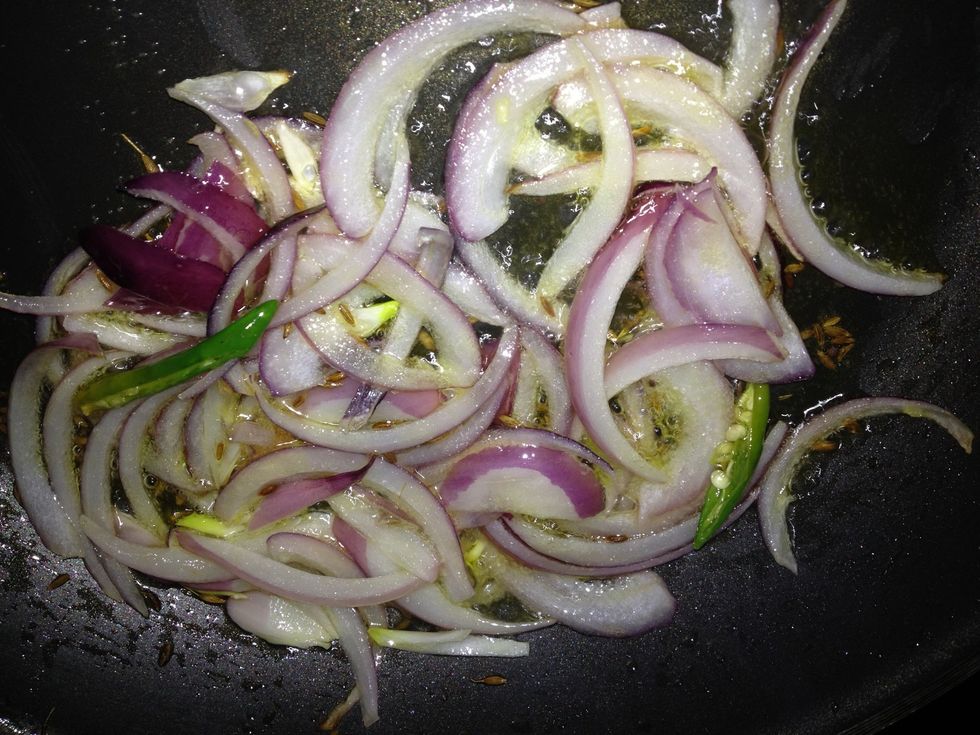 Heat butter in a pan add cumin seeds, green chilli, onions and some salt