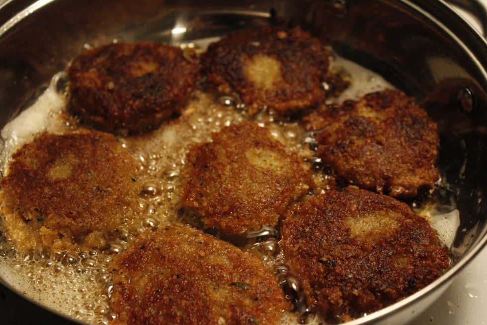 Heat canola oil to 350 degrees Fahrenheit, and carefully place the falafel patties in the oil. Cooked evenly on both sides, and place the patties on paper towels to drain extra oil.