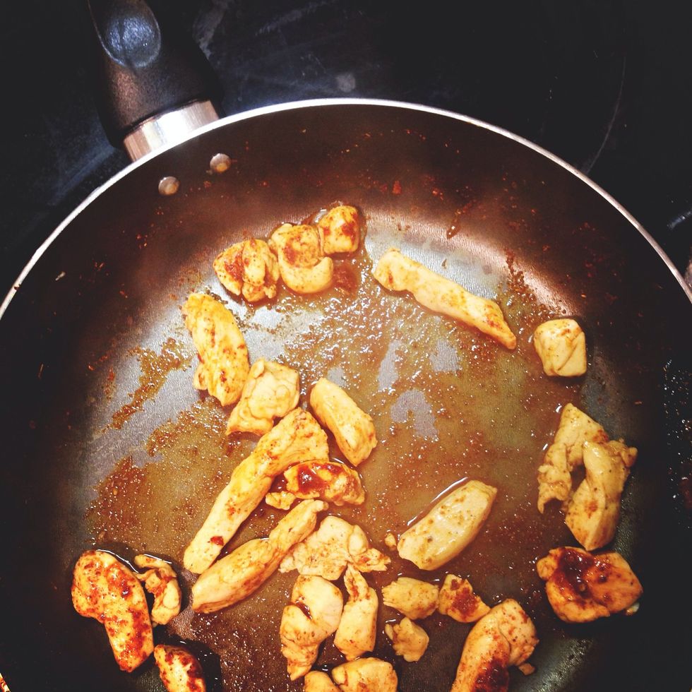 Heat chicken with taco spice until almost finished.