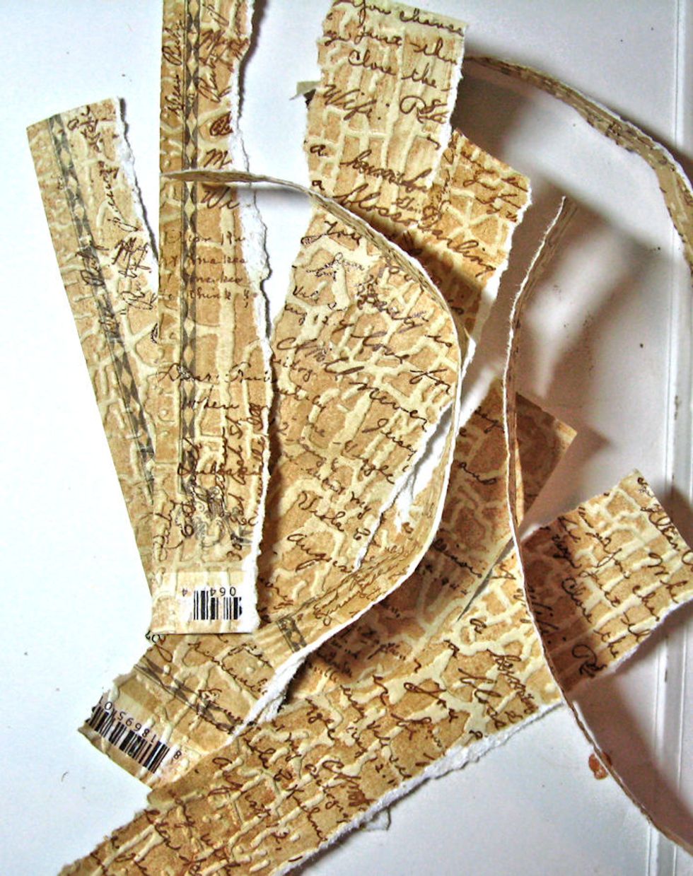 Heat dry papers and tear into random strips. These will be layered onto the outside edges of the shadowbox using the medium of your choice. Add top layer of medium and set aside to dry completely.