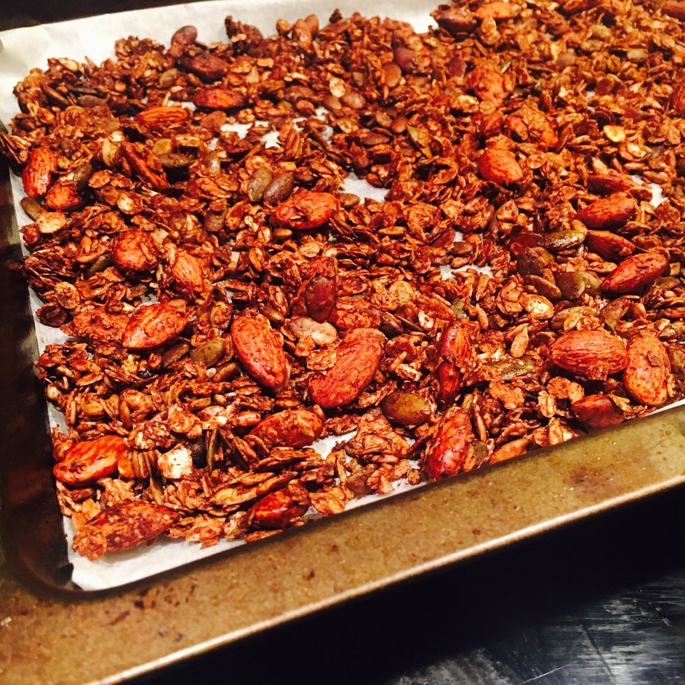 Heat for 10-15 minutes on 160 degrees celcius. Stir around and heat for another 8-10 minutes mixing every 2-3 minutes. Be sure to keep an eye on it as granola burns fast.