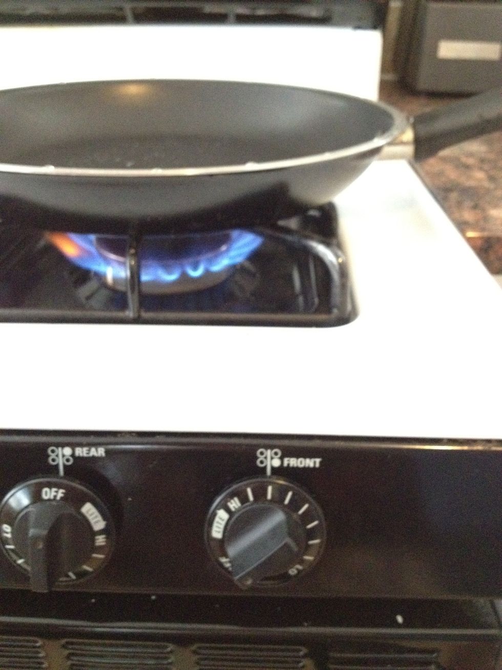 Heat frying pan medium high