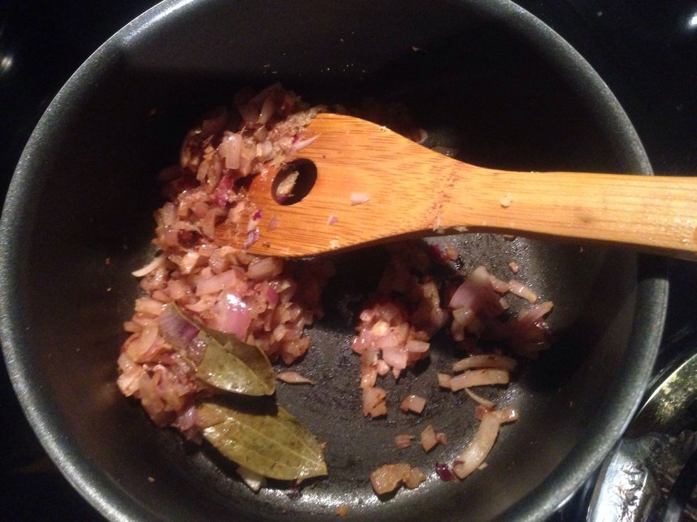 Heat oil (2-3 tablespoon) in a pan, put 1 or 2 small bay leaves, then fry finely chopped onions until they are light golden brown. Add ginger paste and cook it further for a minute.