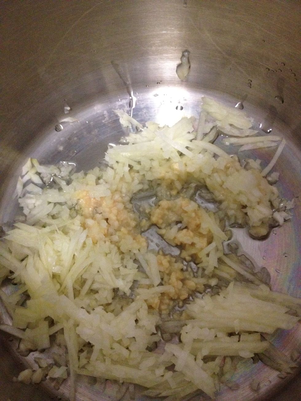 Heat oil and add onion and garlic. Cook for 3 minutes or until onion softens.