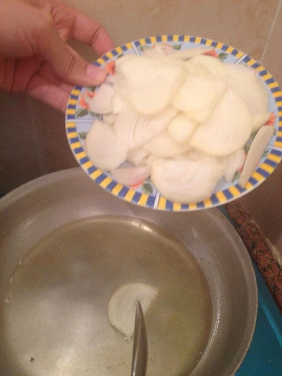Heat oil for frying onions ,then add the chopped onions and stir until cooked