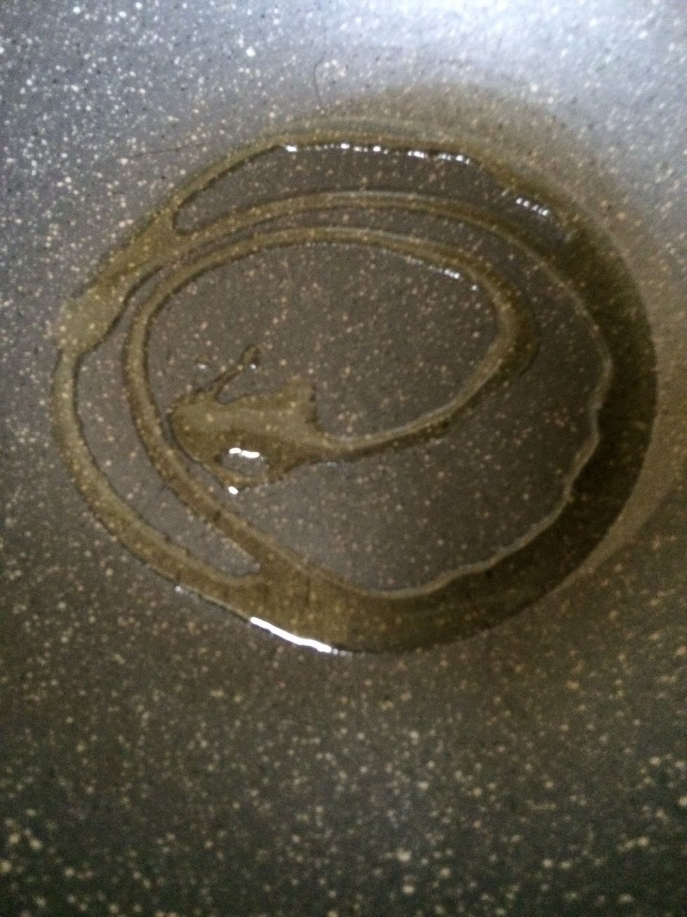 Heat oil in a large deep frying pan