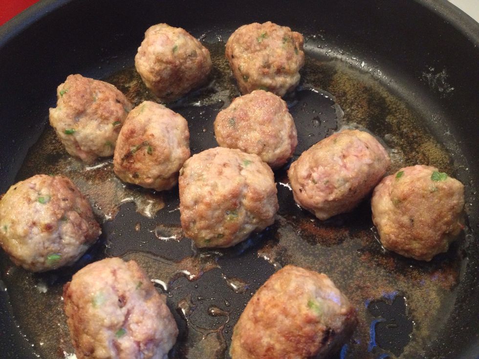 Heat oil in a large fry pan over a medium heat. Cook the meatballs for 5 minutes or until browned. Bury not to break the meatballs apart while stirring.