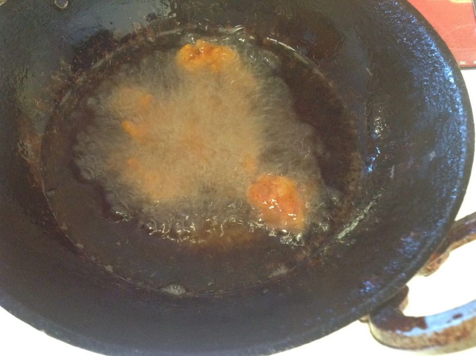 Heat oil in a pan and deep fry the chicken pieces