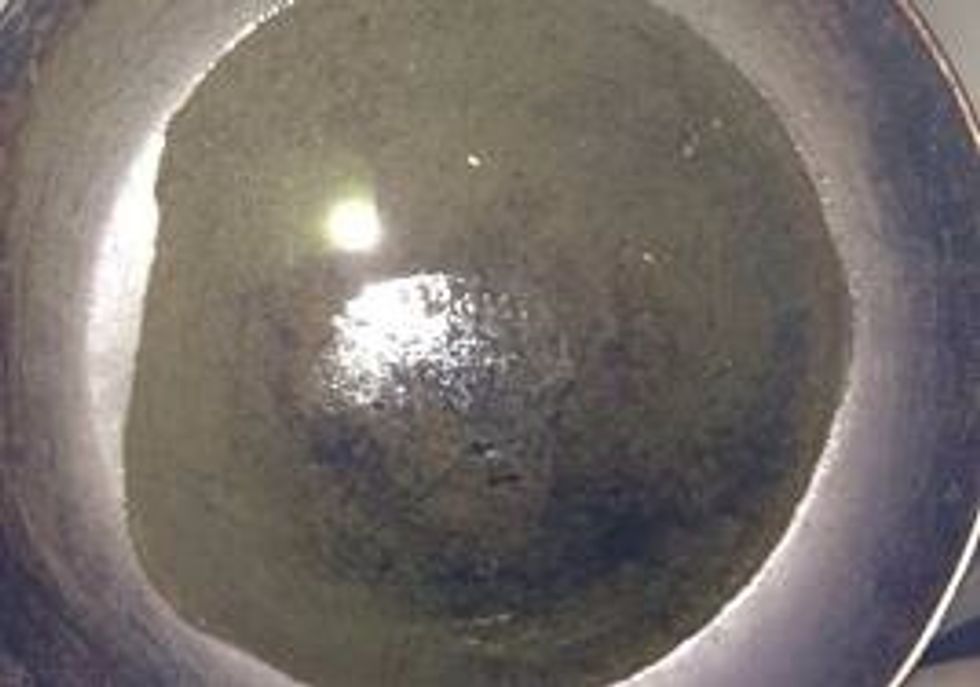 Heat oil in a wok n fry the cheese filled samosas till they r golden brown