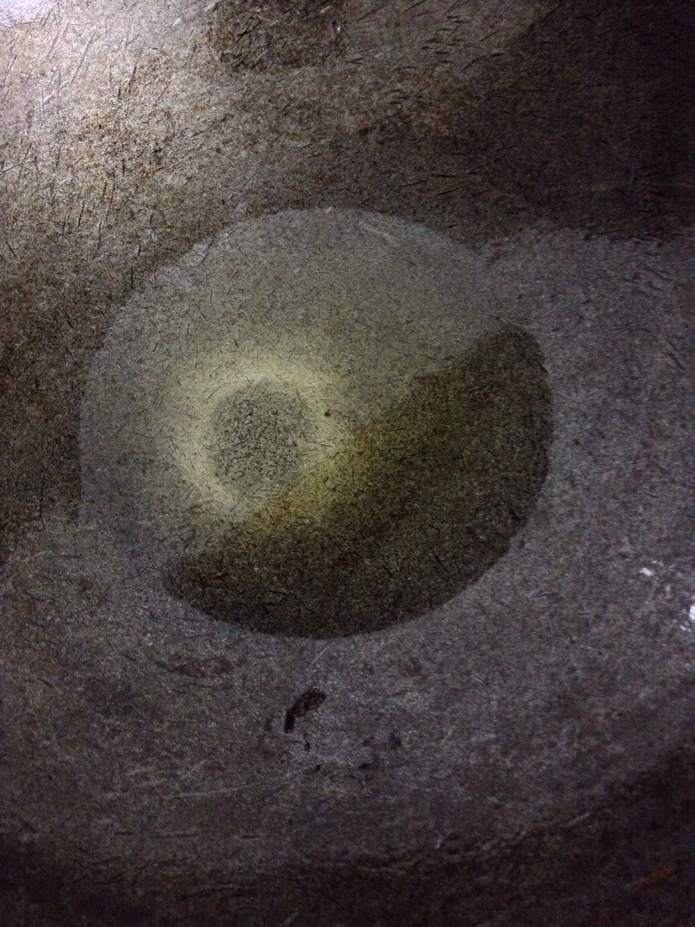 Heat oil in a wok