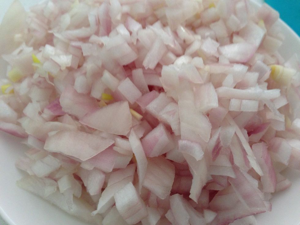 Heat oil in pan on medium to high heat. Fry onions until golden