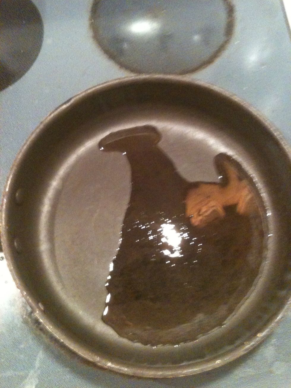 Heat oil in pan.