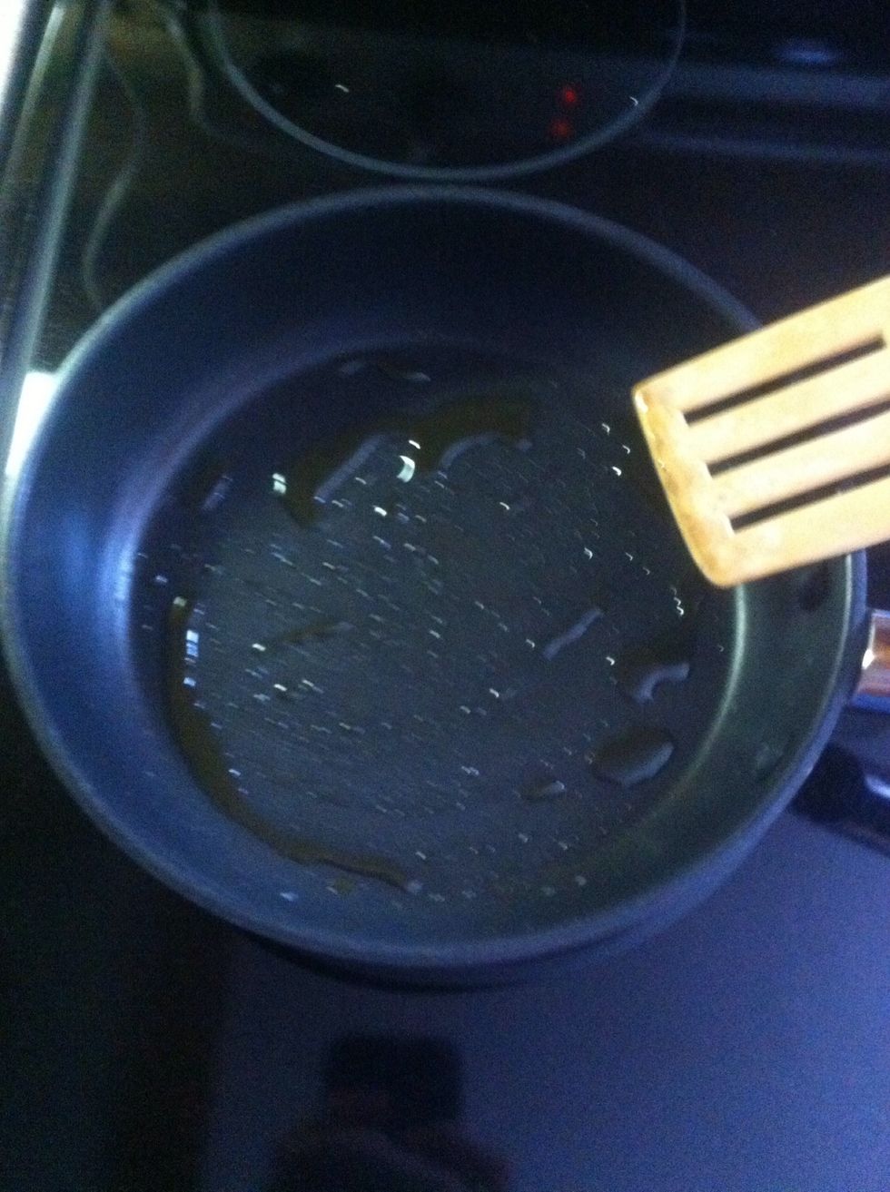 Heat oil in pan.