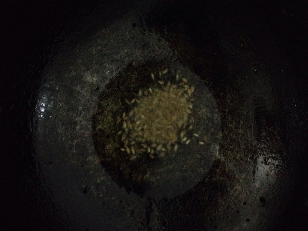 Heat oil in pan