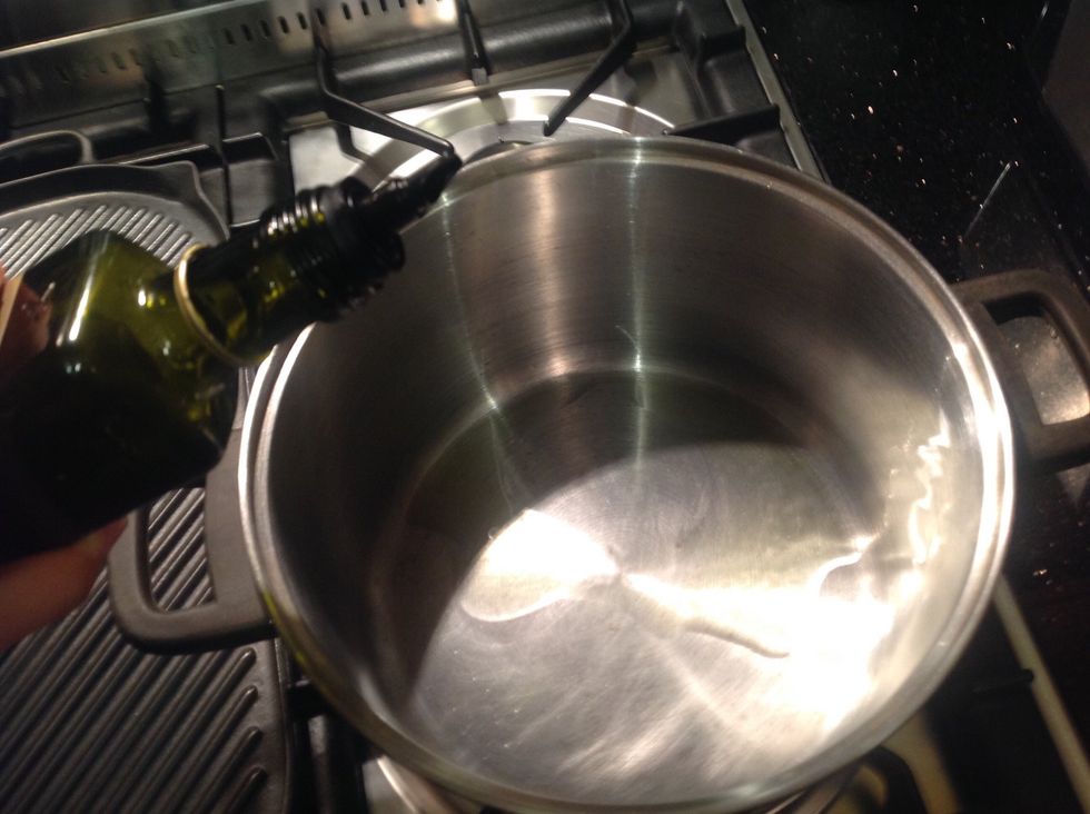 Heat oil in saucepan medium high heat.