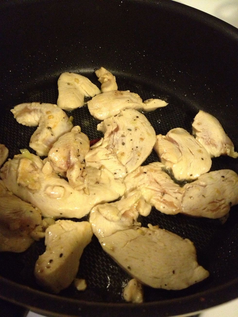 Heat oil in the pot over medium high heat. Saute chicken pieces until cooked. Remove from pot.