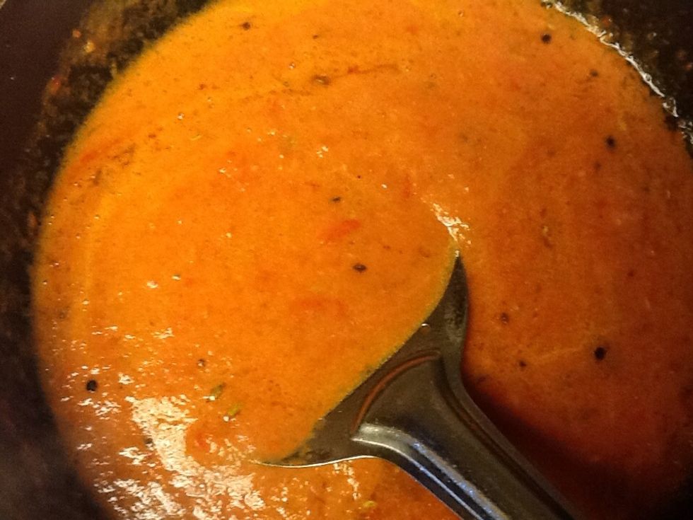 Heat oil in the same pan you used to fry okra's. Splutter some cumin seeds. Add the tomato pur\u00e9e and cook.