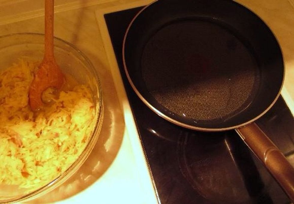 Heat oil on a frying pan.