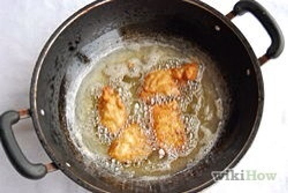 Heat oil on medium heat and deep fry on low heat for 3 to 4 mins, and 2 to 3 pcs at time until golden brown and chicken is cooked.