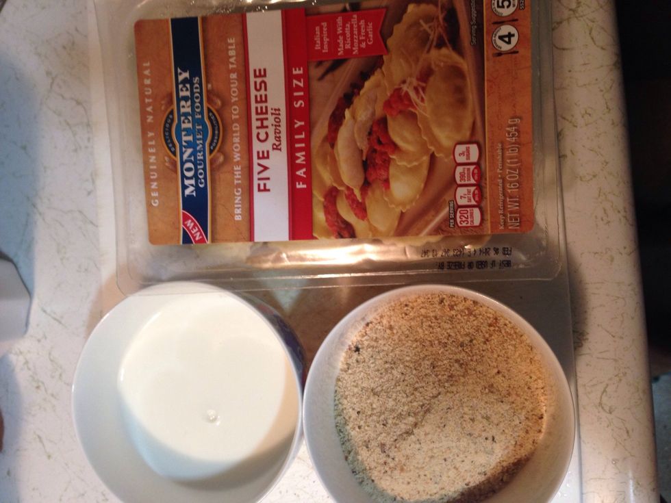 Heat oil over medium heat. For this recipe I'm using five cheese ravioli. You welcome to used any kind of ravioli. Place milk and bread crumbs in separate bowl.