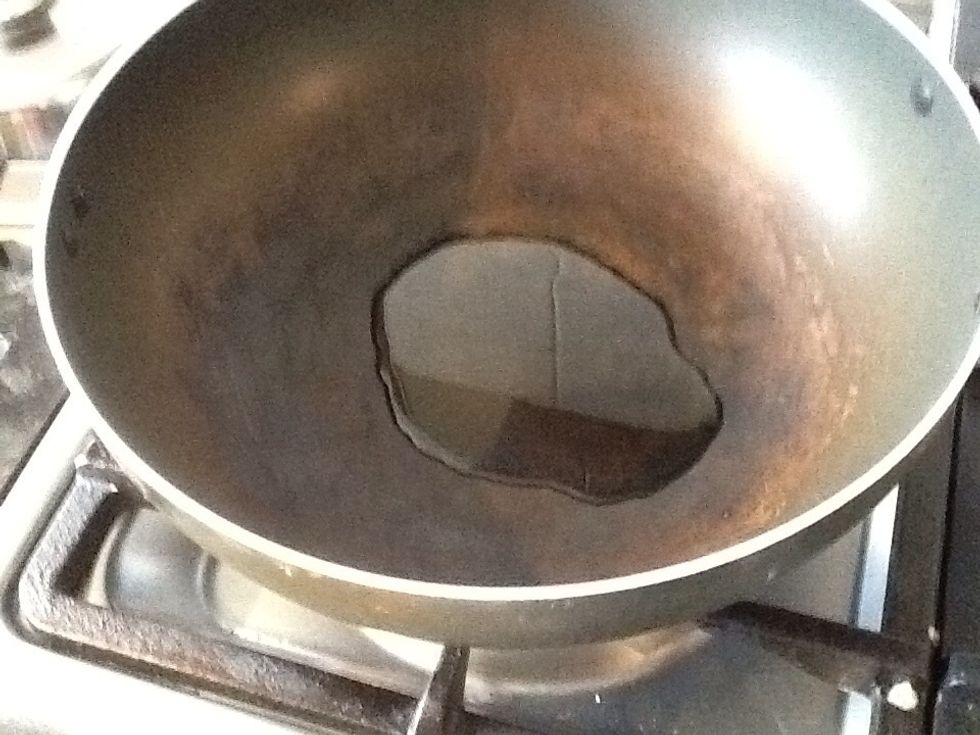 Heat oils in pan.